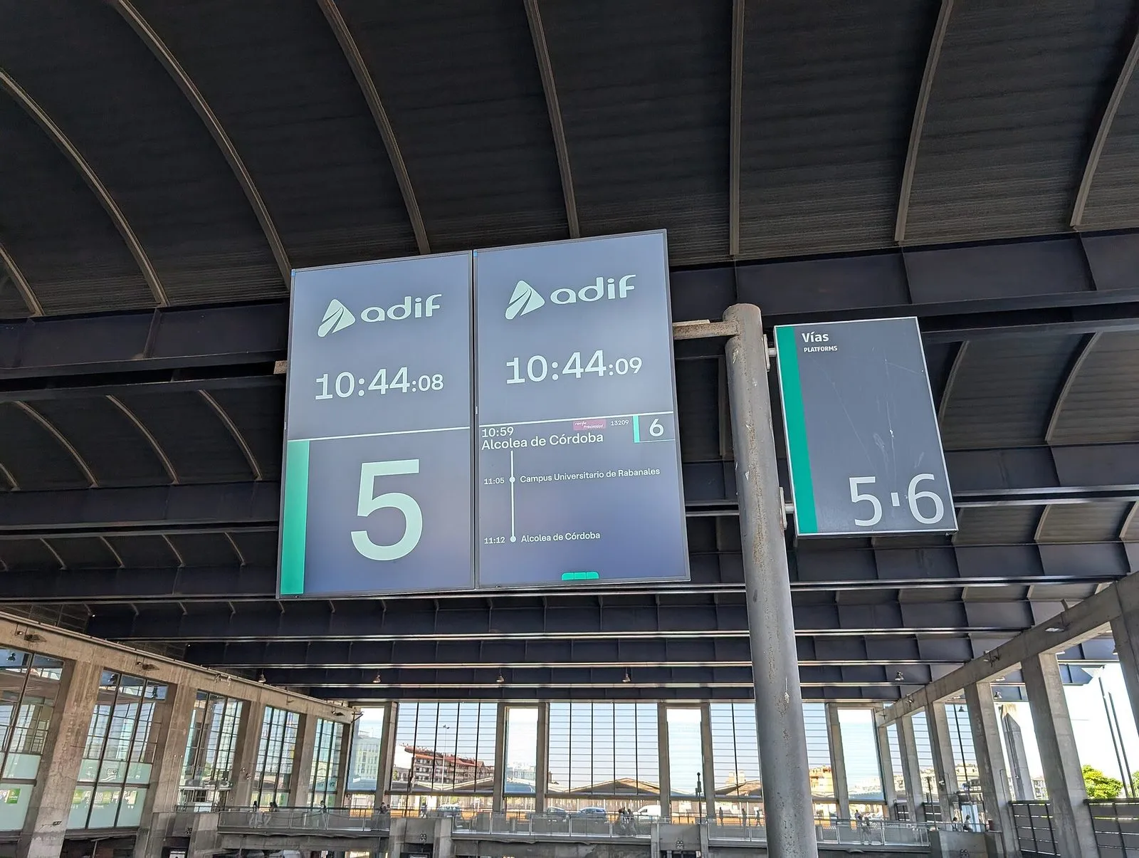Adif platform and departure signs at Córdoba railway station