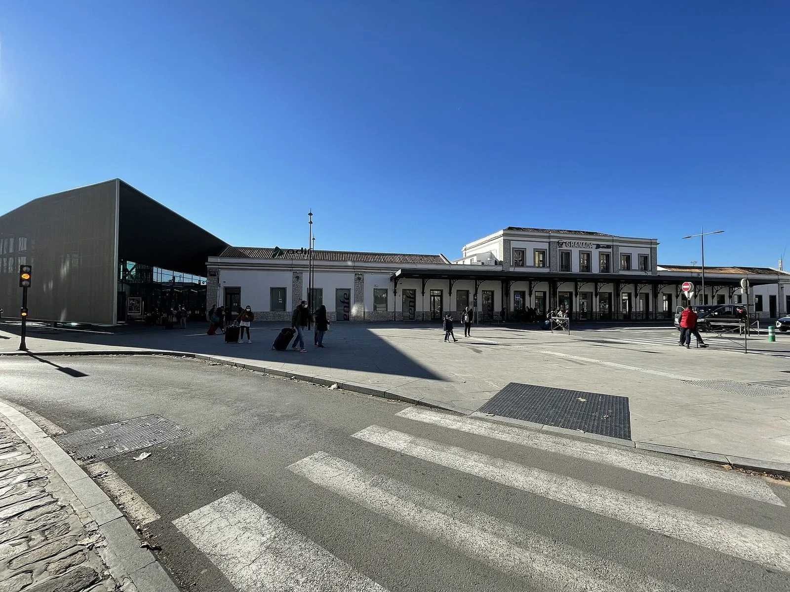 The Granada railway station building and forecourt on a sunny day