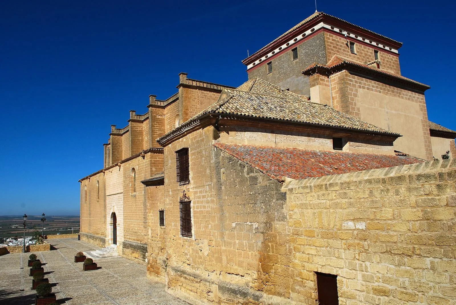 The Renaissance Colegiata de Santa María de la Asunción in Osuna under a blue sky
