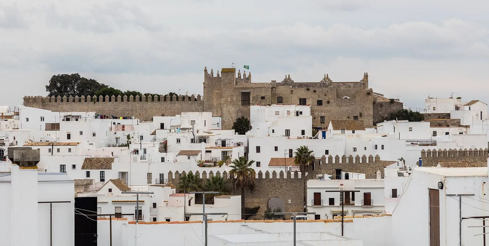 The white houses of Vejer de la Frontera below its medieval walls and castle